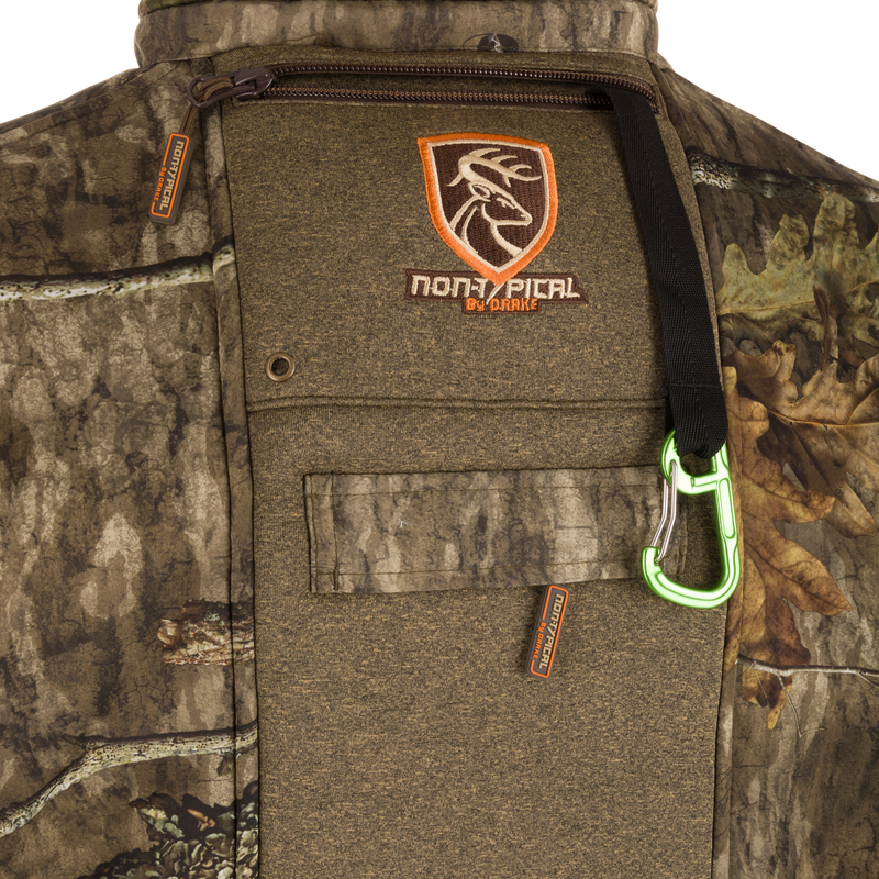 Stand Hunter's Silencer Jacket with Scent Control, featuring multiple pockets, a carabiner clip, fleece lining, and a durable, quiet fabric for effective late-season hunting.