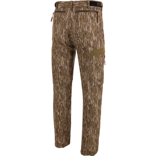 EST Camo Tech Stretch Pants with Scent Control featuring camouflage pattern, adjustable waistband, multiple zippered pockets, and elastic ankle cinch cord for versatile hunting comfort.