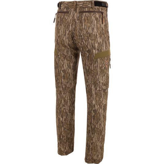 EST Camo Tech Stretch Pants with Scent Control featuring camouflage pattern, adjustable waistband, multiple zippered pockets, and elastic ankle cinch cord for versatile hunting comfort.