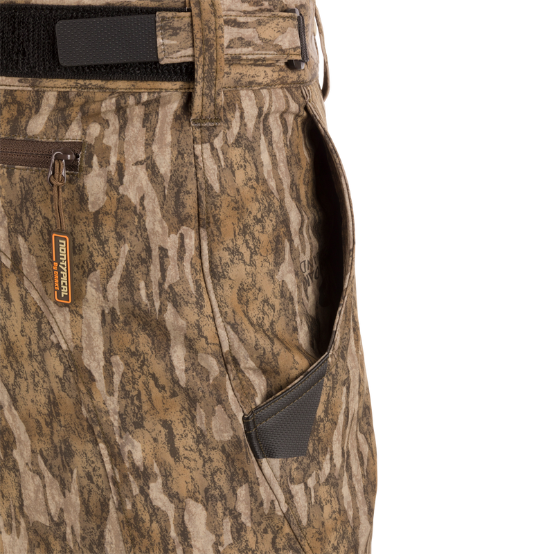 Close-up of zippered pocket on EST Stretch Tech Pants with Scent Control, showcasing durable construction and practical storage features for versatile hunting use.