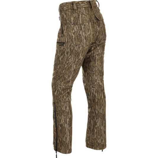 MST Microfleece Softshell Pant with Scent Control, showcasing camouflage design, side-elastic waist, articulated knees, and zippered pockets for superior comfort and functionality.