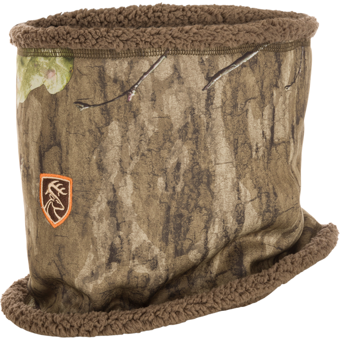 Youth Non-Typical Silencer Sherpa Fleece Neck Gaiter with Agion Active XL, featuring camo design and logo detail. Perfect for hunting with scent-control technology and warm sherpa fleece lining.