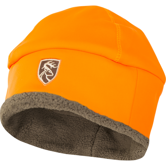 Non-Typical Silencer Sherpa Fleece Beanie with Agion Active XL® logo on an orange cap. Deep cut for ear protection, scent control technology. From Drake Waterfowl, known for premium hunting gear.