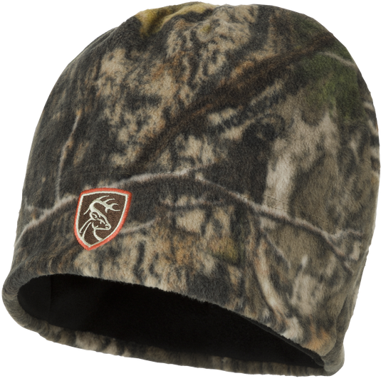 Non-Typical Camo Windproof Fleece Beanie featuring a logo, designed for ear coverage with deep-cut windproof fleece material.