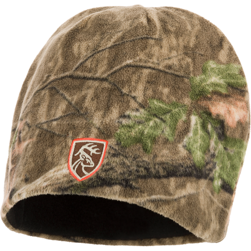 Non-Typical Camo Windproof Fleece Beanie featuring a deer logo, designed with a deep cut to cover ears and prevent heat loss.