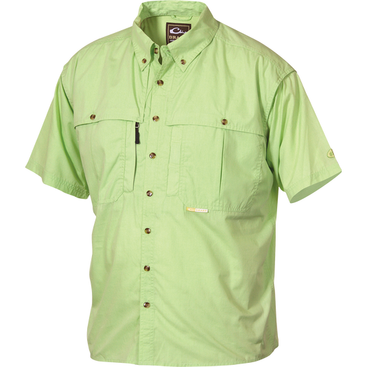 Cotton Wingshooter's Shirt with StayCool™ Fabric S/S, featuring buttons, chest pockets, and front/back ventilation, displayed on a mannequin for a clear view of its design and functionality.