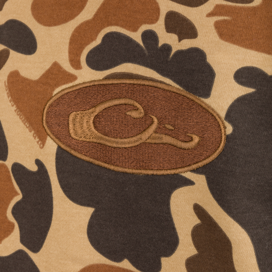 Close-up of the Youth Three End Old School Hoodie, showcasing the brown patch on camouflage fabric.