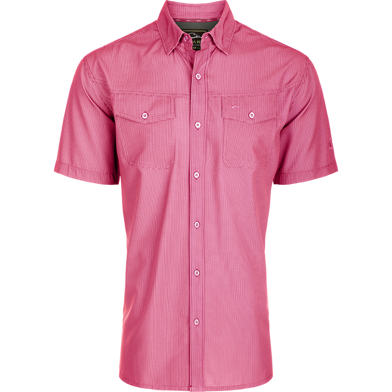 Traveler's Check Button-Down Short Sleeve Shirt featuring a red and white checkered pattern, two chest pockets with button flaps, and a comfortable, moisture-wicking fabric.