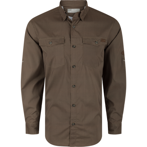 A brown Frat Gingham Check Button-Down Shirt with hidden collar, chest pockets, and vented back. Lightweight, moisture-wicking fabric with UPF30 sun protection and sculpted hem. Ideal for hunting and outdoor activities.