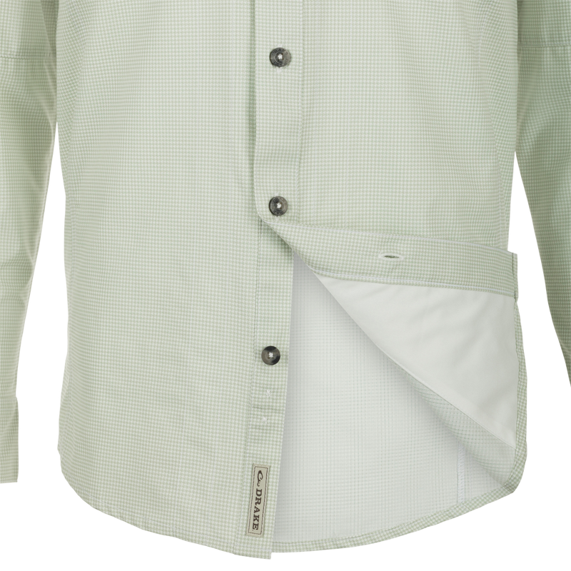 A Drake Waterfowl Frat Houndstooth Check Button-Down Shirt with hidden collar, chest pockets, and vented back. Features include UPF30, moisture-wicking fabric, and sculpted hem for versatile wear.