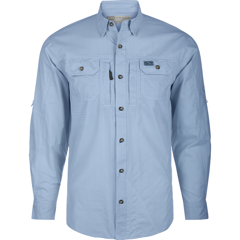 A performance-driven Drake Frat Houndstooth Check Button-Down Shirt in blue. Features include UPF30 sun protection, moisture-wicking fabric, hidden collar, chest pockets, and adjustable sleeves. Ideal for hunting and outdoor activities.