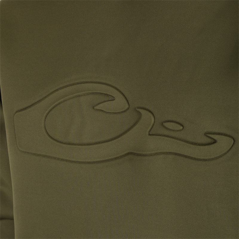 Close-up of Back Eddy Embossed Logo Hoodie fabric, showcasing raised Drake logo, DWR coating for water resistance, kangaroo pocket, and lined hood with adjustable drawstrings. Ideal for hunting and outdoor activities.