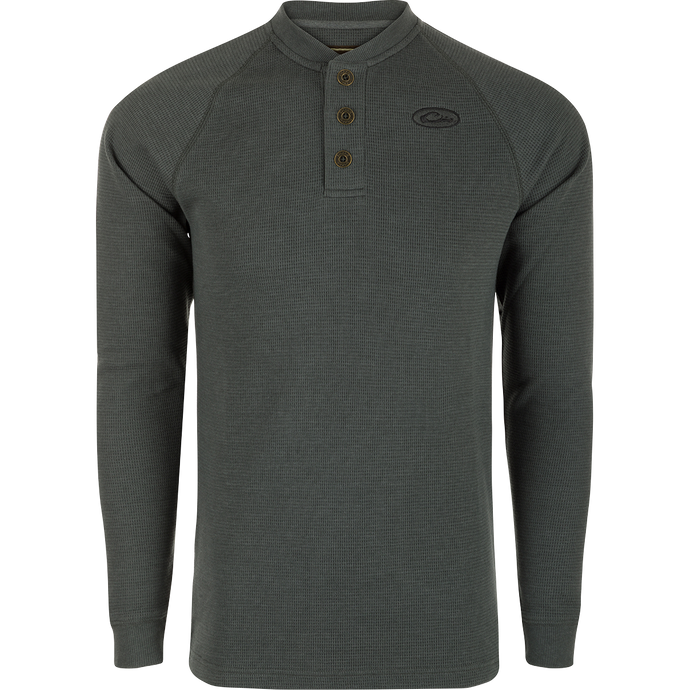 A durable Weston Lakes Waffle Henley in grey, featuring raglan sleeves, metal logo buttons, and rib knit details. Ideal for hunting and outdoor activities.