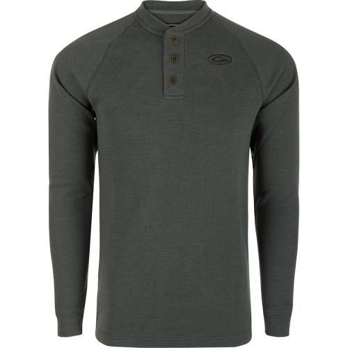 A durable Weston Lakes Waffle Henley in grey, featuring raglan sleeves, metal logo buttons, and rib knit details. Ideal for hunting and outdoor activities.