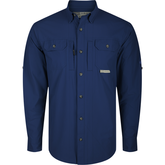 Wingshooter Trey Shirt L/S with long sleeves, hidden button-down collar, two chest pockets, vented cape back, and adjustable roll-up sleeves. High-performance fabric features.