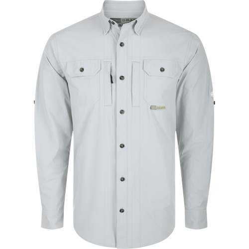 Long-sleeved white Wingshooter Trey Shirt with hidden button-down collar, two chest pockets, vented cape back, and adjustable roll-up sleeves.