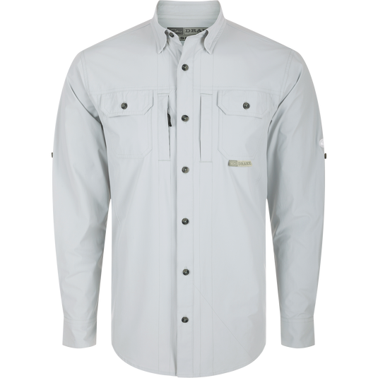 Long-sleeved white Wingshooter Trey Shirt with hidden button-down collar, two chest pockets, vented cape back, and adjustable roll-up sleeves.