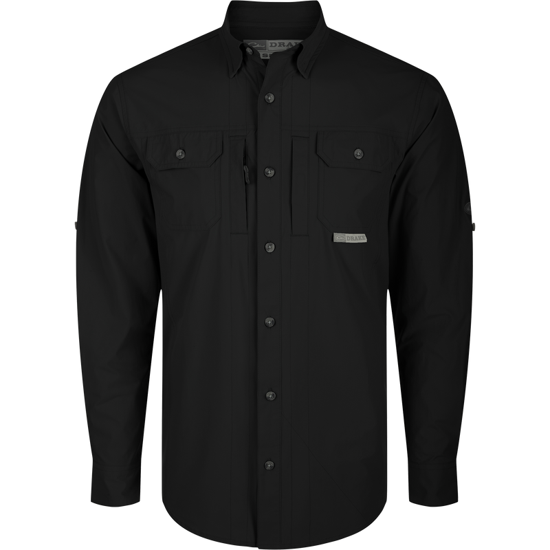 Wingshooter Trey Shirt L/S: Black long-sleeved performance shirt with hidden button-down collar, vented back, and chest pockets. Features moisture-wicking, UPF 30 protection, and adjustable roll-up sleeves.