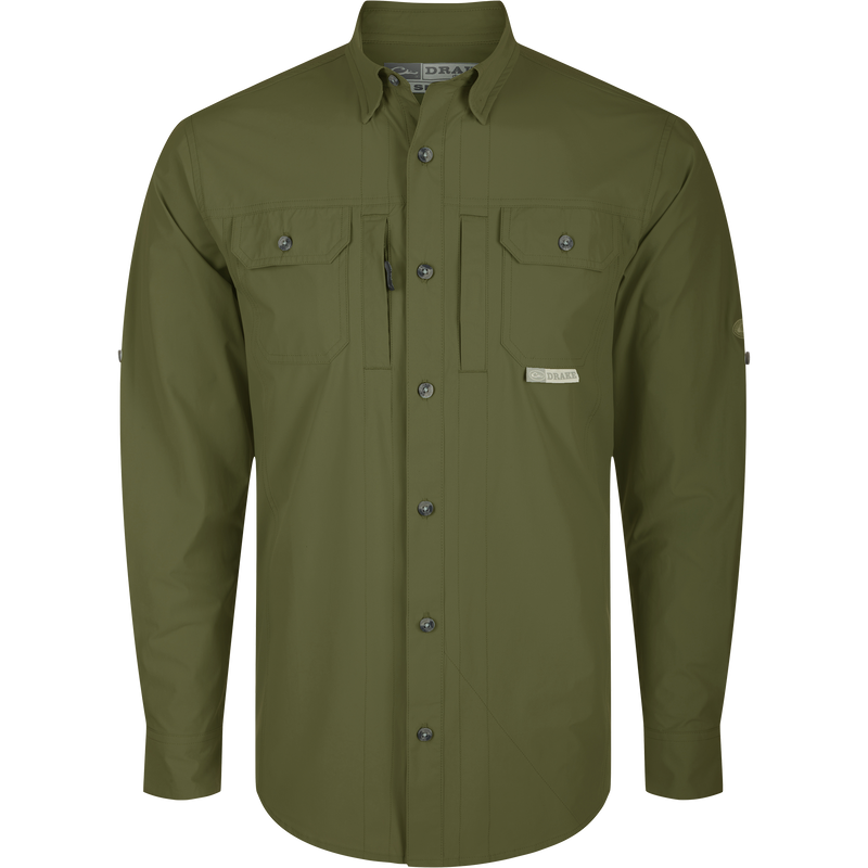 Wingshooter Trey Shirt L/S: Long-sleeved green shirt with hidden button-down collar, two flap chest pockets, vented back, and adjustable roll-up sleeves. Ideal for performance and outdoor activities.