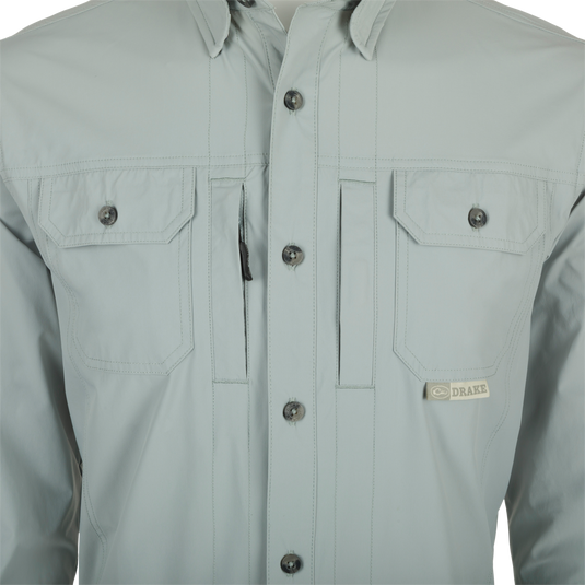 Close-up of a Drake Wingshooter Trey Shirt L/S featuring a button-down collar, chest pockets, and vented back for enhanced performance and comfort.