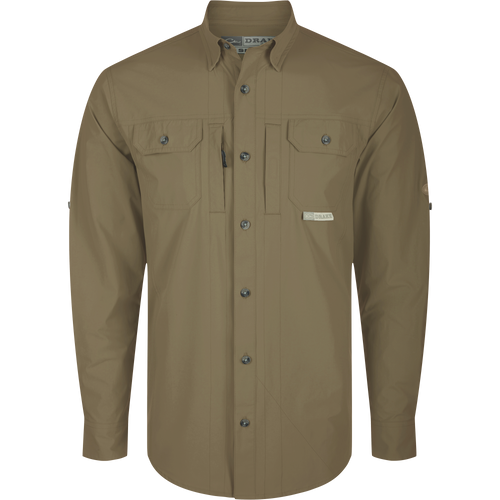 A long-sleeved Wingshooter Trey Shirt with button-down collar, flap chest pockets, and vented cape back, designed for performance and comfort.