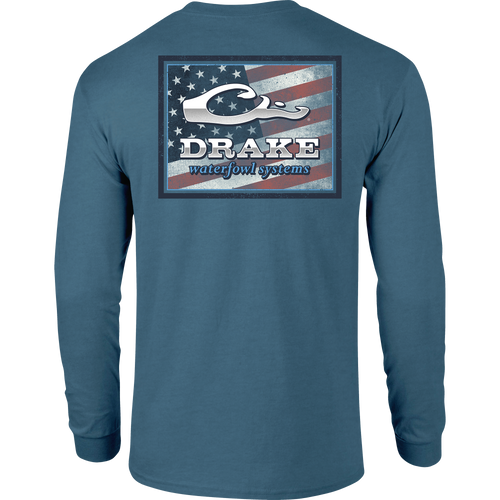 A Flag Square Long Sleeve T-Shirt featuring a Drake logo pocket and an American Flag graphic from the Americana Drake Series. Made of 60% cotton and 40% polyester blend for comfort. By Drake Waterfowl.