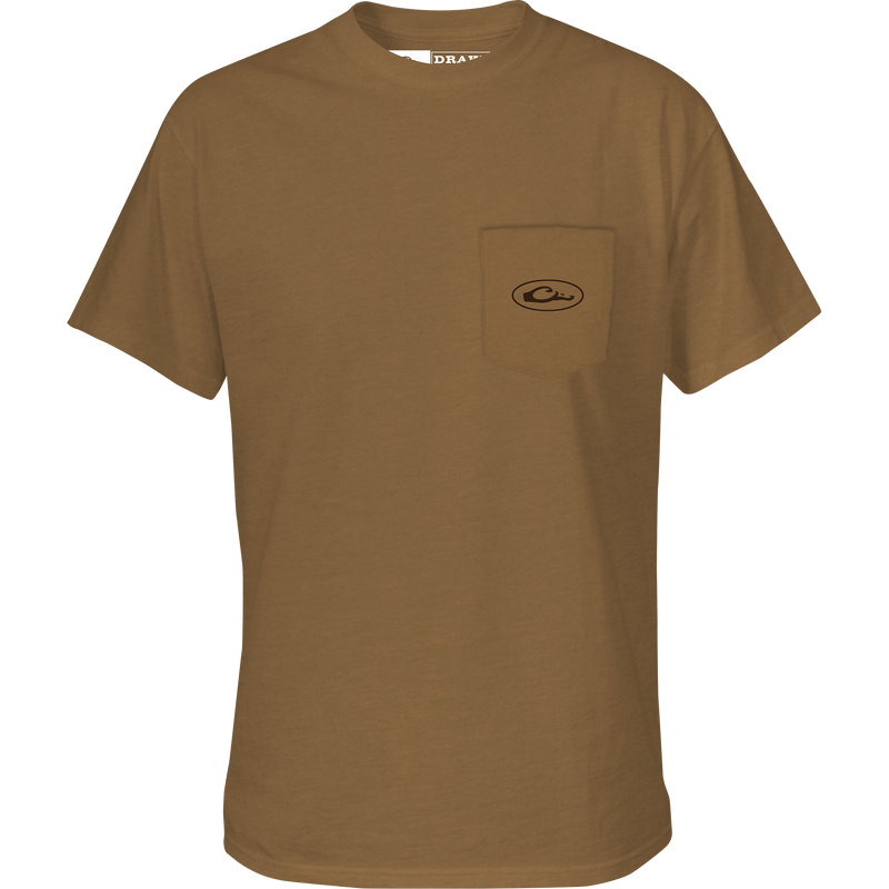 A Drake Waterfowl Standing Black Lab T-Shirt with logo pocket. 60% cotton, 40% polyester blend for softness. Features Drake logo on the front pocket and Lab graphic on the back.