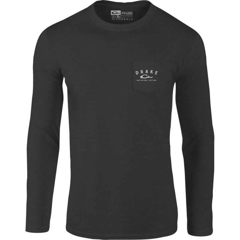 A black long-sleeved tee from Drake Waterfowl, featuring a Drake logo on the front pocket and ducks in flight on the back from the Old School Camo Series. Cotton/polyester blend, lightweight at 180 GSM.