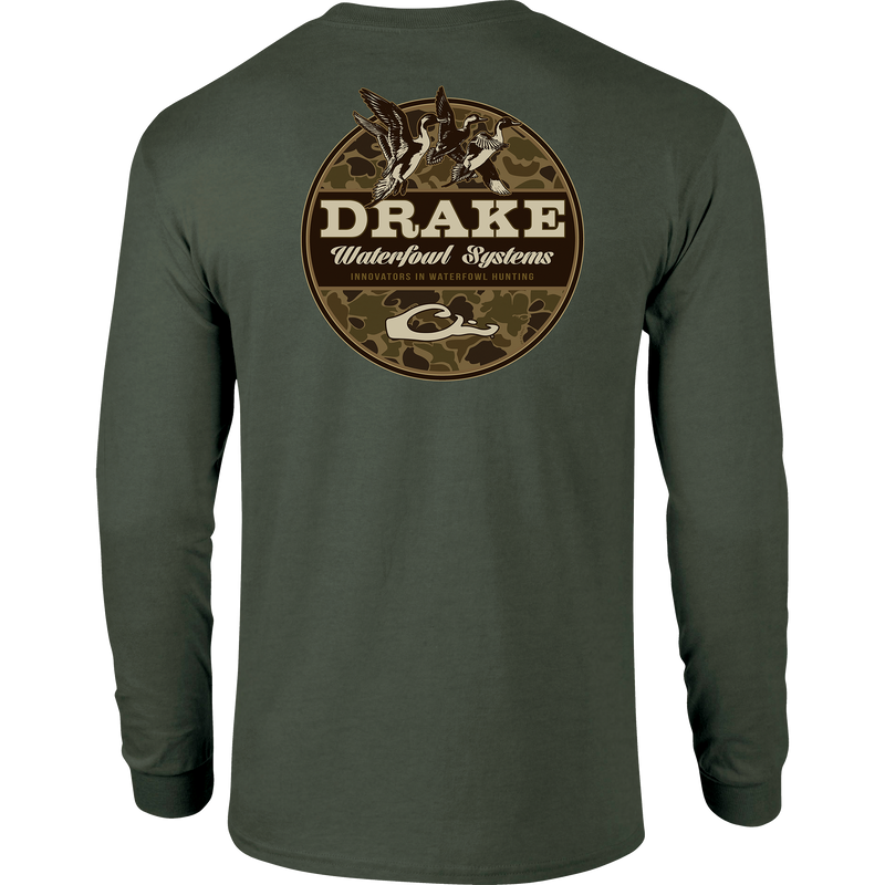 A long-sleeved green shirt featuring a Drake logo on the front pocket and ducks in flight on the back graphic tee from the Old School Camo Series. Made of 60% cotton and 40% polyester for softness and comfort.