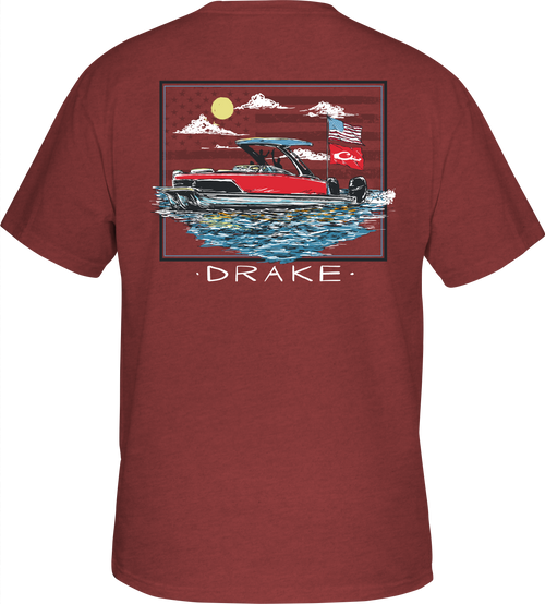 Pontoon Flag T-Shirt featuring a pontoon boat overlay on an American flag, with a front pocket showcasing the Drake logo, crafted for comfort and style.