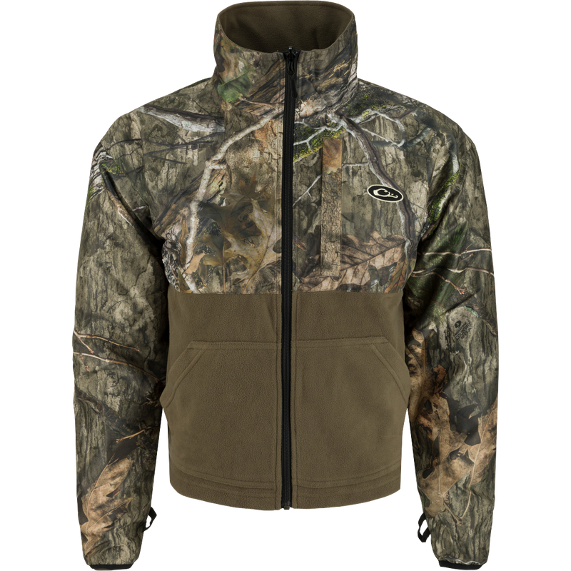 A versatile camouflage jacket with waterproof/windproof/breathable fabric, Eqwader technology, and multiple pockets. LST Refuge 3-in-1 Jacket - Mossy Oak Country DNA.