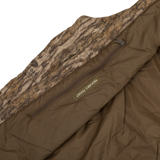 Close-up of the MST Synthetic Down Pack Vest showing the durable zipper and label detailing.