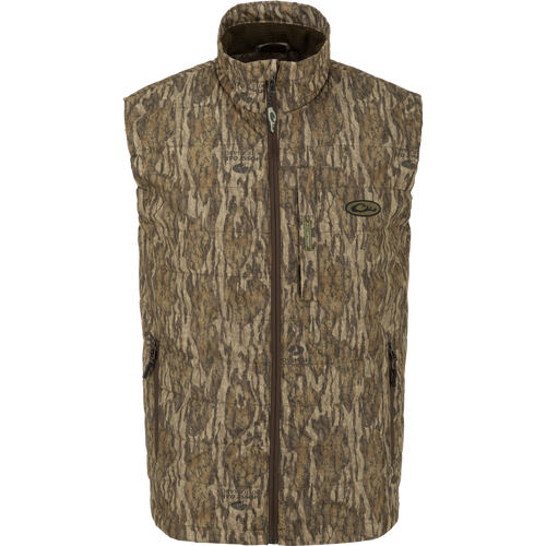 MST Synthetic Down Pack Vest with zipper, horizontal baffle design, adjustable waist, and packable into its own chest pocket. Ideal for versatile outdoor use.