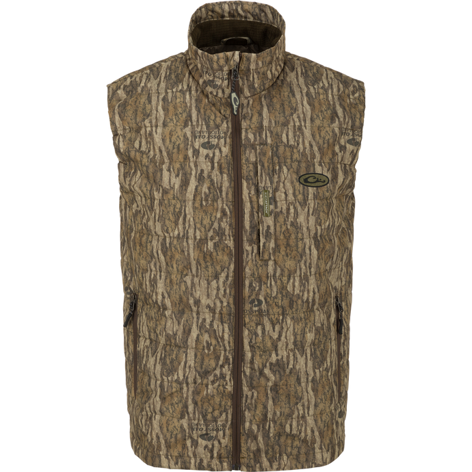 MST Synthetic Down Pack Vest with zipper, horizontal baffle design, adjustable waist, and packable into its own chest pocket. Ideal for versatile outdoor use.