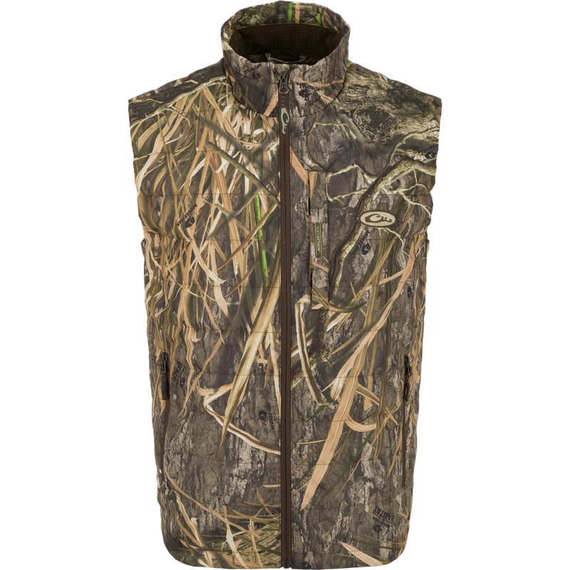 Alt text: MST Synthetic Down Pack Vest featuring a camouflage pattern, zippered chest pocket, and drawcord adjustable waist.