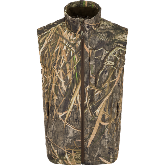 Alt text: MST Synthetic Down Pack Vest featuring a camouflage pattern, zippered chest pocket, and drawcord adjustable waist.