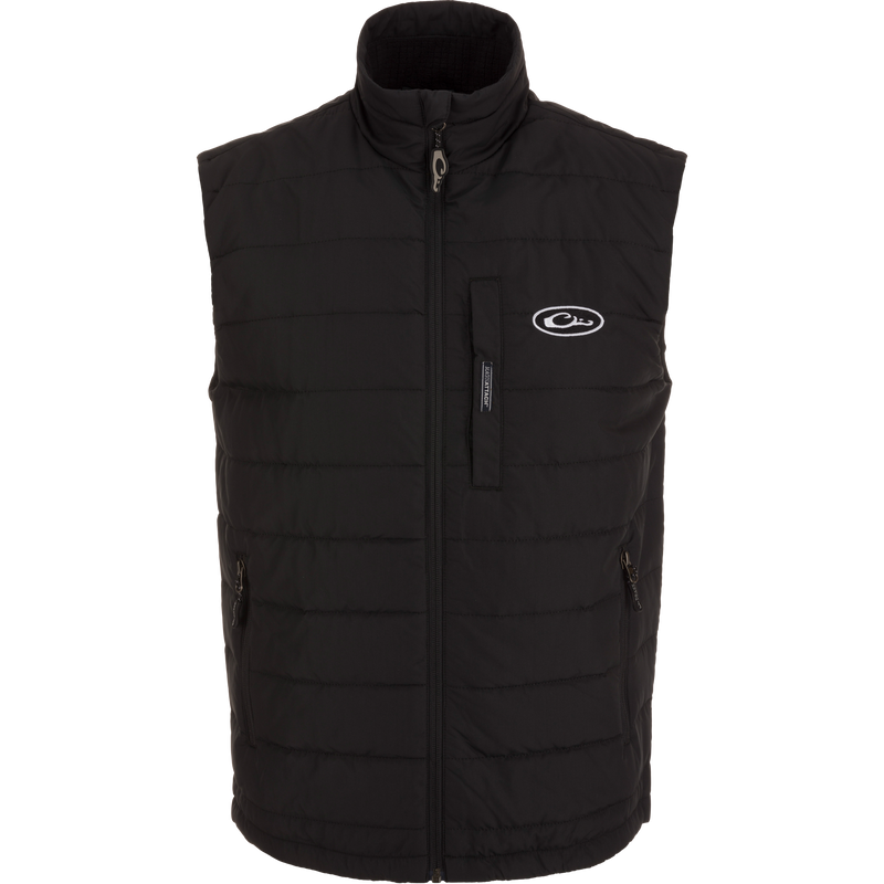 MST Synthetic Down Pack Vest with white logo, featuring durable shell, adjustable waist, and zippered pockets, ideal for versatile, lightweight warmth and easy packing.