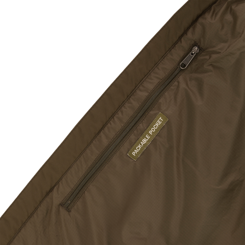 Close-up of the MST Synthetic Down Pack Vest zipper and label, highlighting the durable, matte-finish shell material and synthetic down insulation.