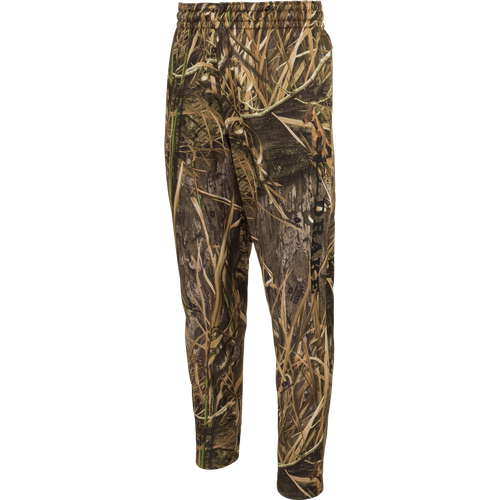 MST Waterfowl Under-Wader Jogger, featuring camouflage design, tapered legs, front slash pockets, and Magnattach™ closure rear pockets for convenient storage. Ideal for use under waders.