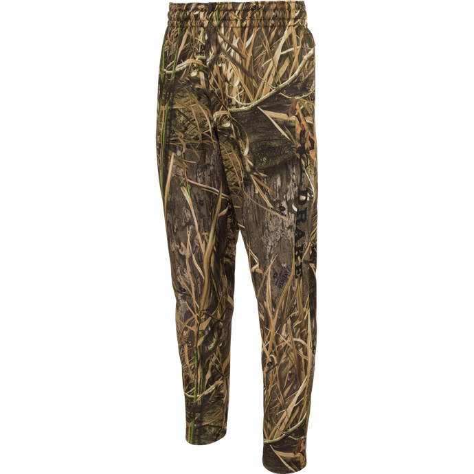 MST Waterfowl Under-Wader Jogger, featuring camouflage design, tapered legs, front slash pockets, and Magnattach™ closure rear pockets for convenient storage. Ideal for use under waders.