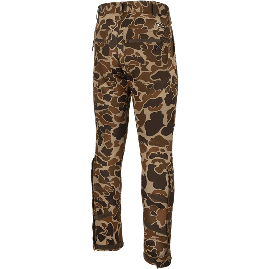 MST Ultimate Wader Pants - Old School: Camouflage pants with adjustable ankle zippers for a tight fit under waders or casual wear, featuring multiple pockets and elastic waist.