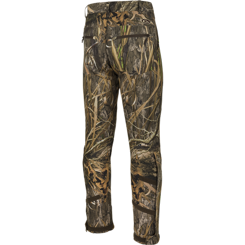 MST Ultimate Wader Pants: Versatile hunting pants with adjustable ankle fit, side zippers, and secure pockets. Ideal for hunting and outdoor activities.