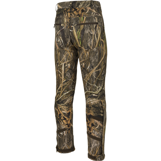 MST Ultimate Wader Pants: Versatile hunting pants with adjustable ankle fit, side zippers, and secure pockets. Ideal for hunting and outdoor activities.