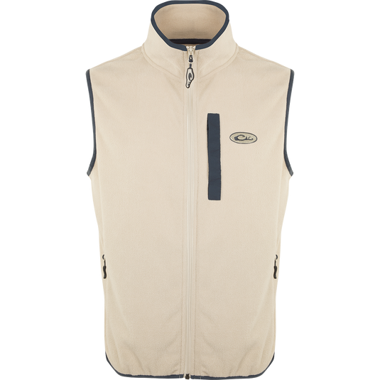 Camp Fleece Vest, lightweight and breathable with anti-pill treatment, features vertical Magnattach™ pocket and zippered hand warmer pockets, ideal for layering in outdoor activities.