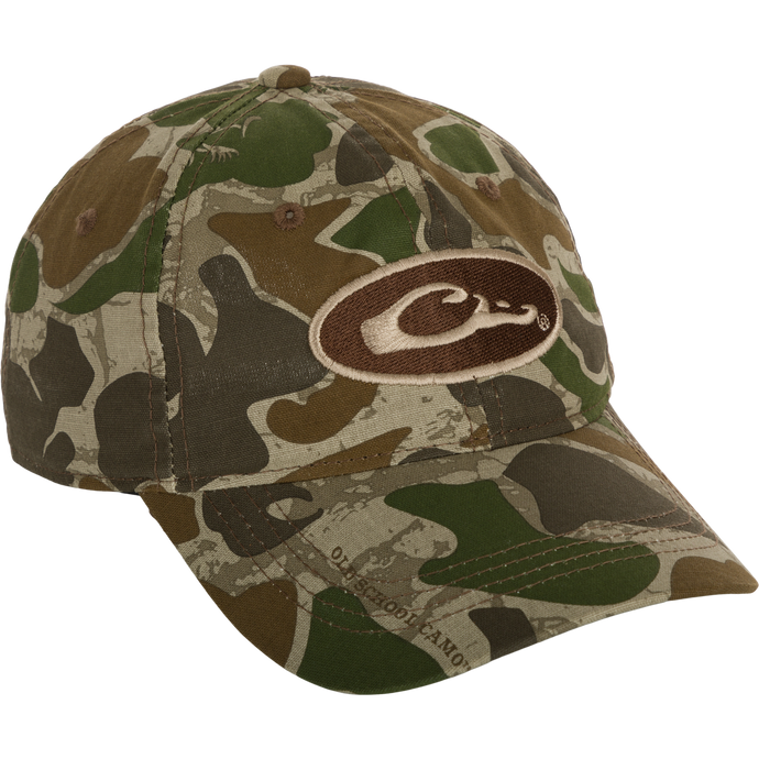 Camo Cotton Cap with logo, 6-panel construction, and hook and loop closure. Lightweight and comfortable for outdoor activities.