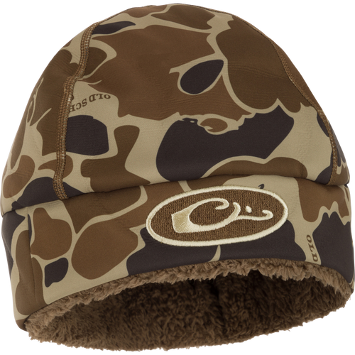 LST Windstopper Beanie: A camouflage hat with a logo, perfect for hunting and outdoor activities.