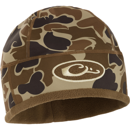 Camouflage MST Windstopper Beanie with logo, designed for windproof, breathable warmth, covering the ears for enhanced protection during mid-to-late season hunting.