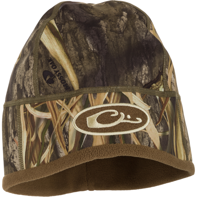 Camouflage MST Windstopper Beanie with logo, designed for windproof and breathable comfort, featuring a soft grid-fleece lining and ear coverage.