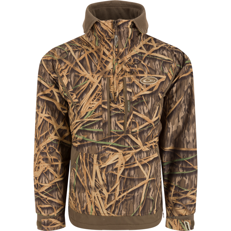 MST Waterproof Fleece-Lined Quarter Zip Jacket, showcasing camouflage pattern, adjustable cuffs, extendable collar, and multiple pockets for secure storage and comfort in hunting conditions.