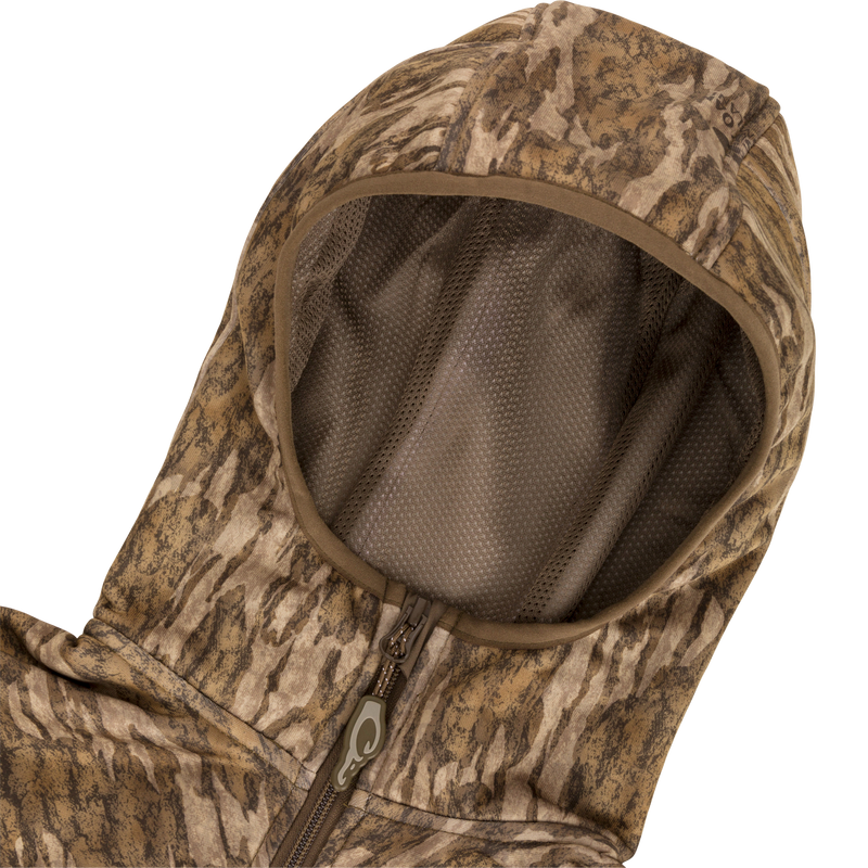 Technical Performance Fleece Full Zip Jacket with camouflage pattern, featuring a zippered chest pocket and fleece-lined hood, ideal for lightweight insulation in warmer hunting conditions.